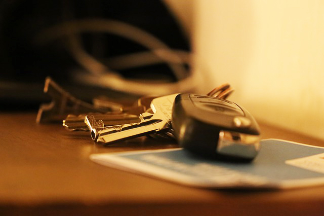 A pair of car keys on a table