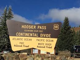 The sign at the top of Hoosier Pass shows the watershed.